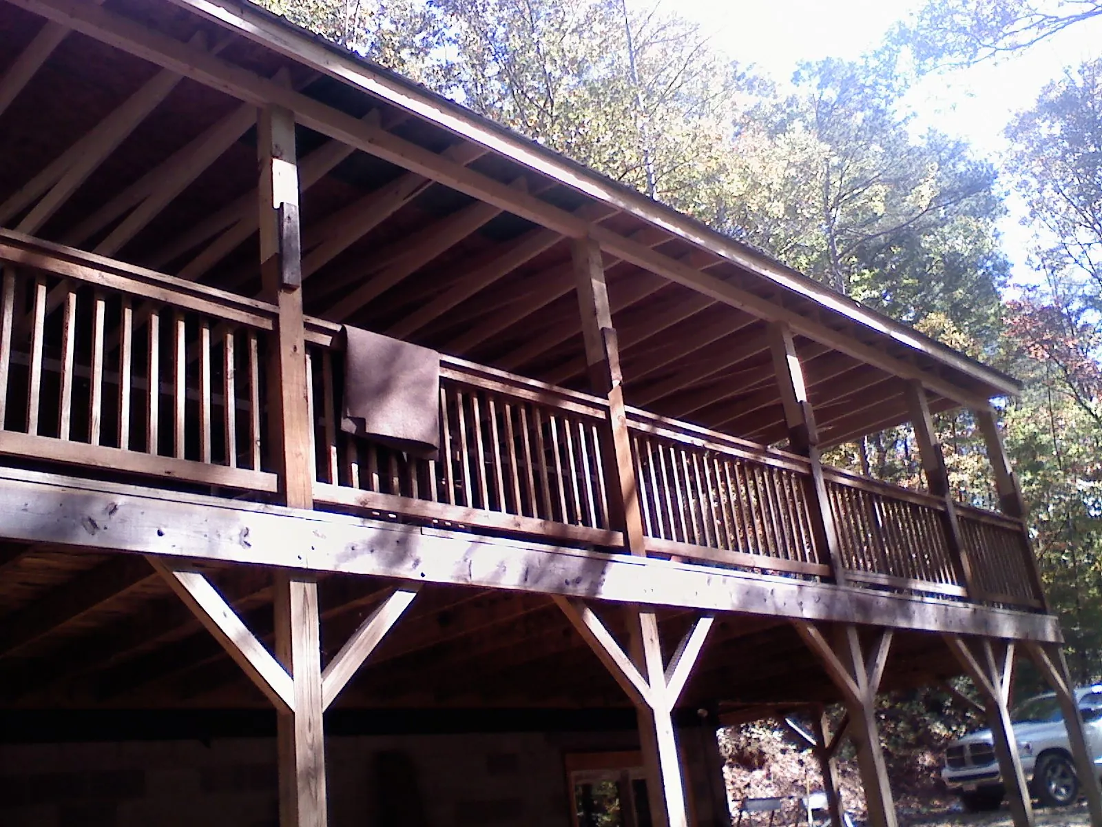 Timber framing under a new elevated porch and deck — Roof Leak Repair in Wrentham by Roofing Brothers